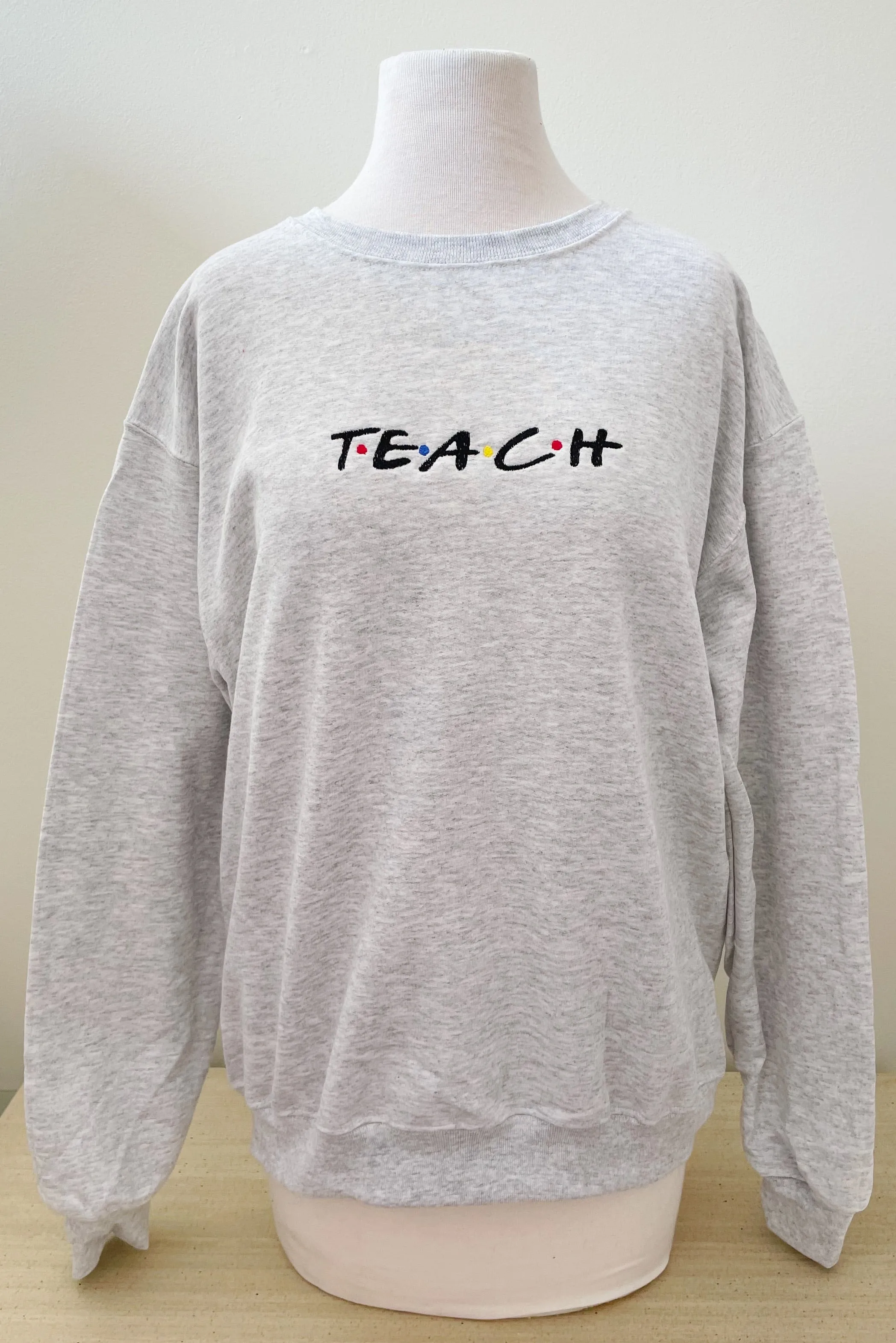 Teach Embroidered Sweatshirts